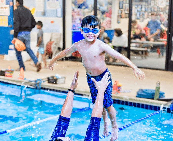 child-happy-in-air-700x569